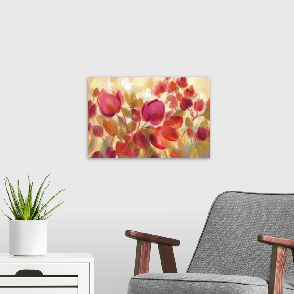A modern room featuring Contemporary painting of bright flowers in warm tones.