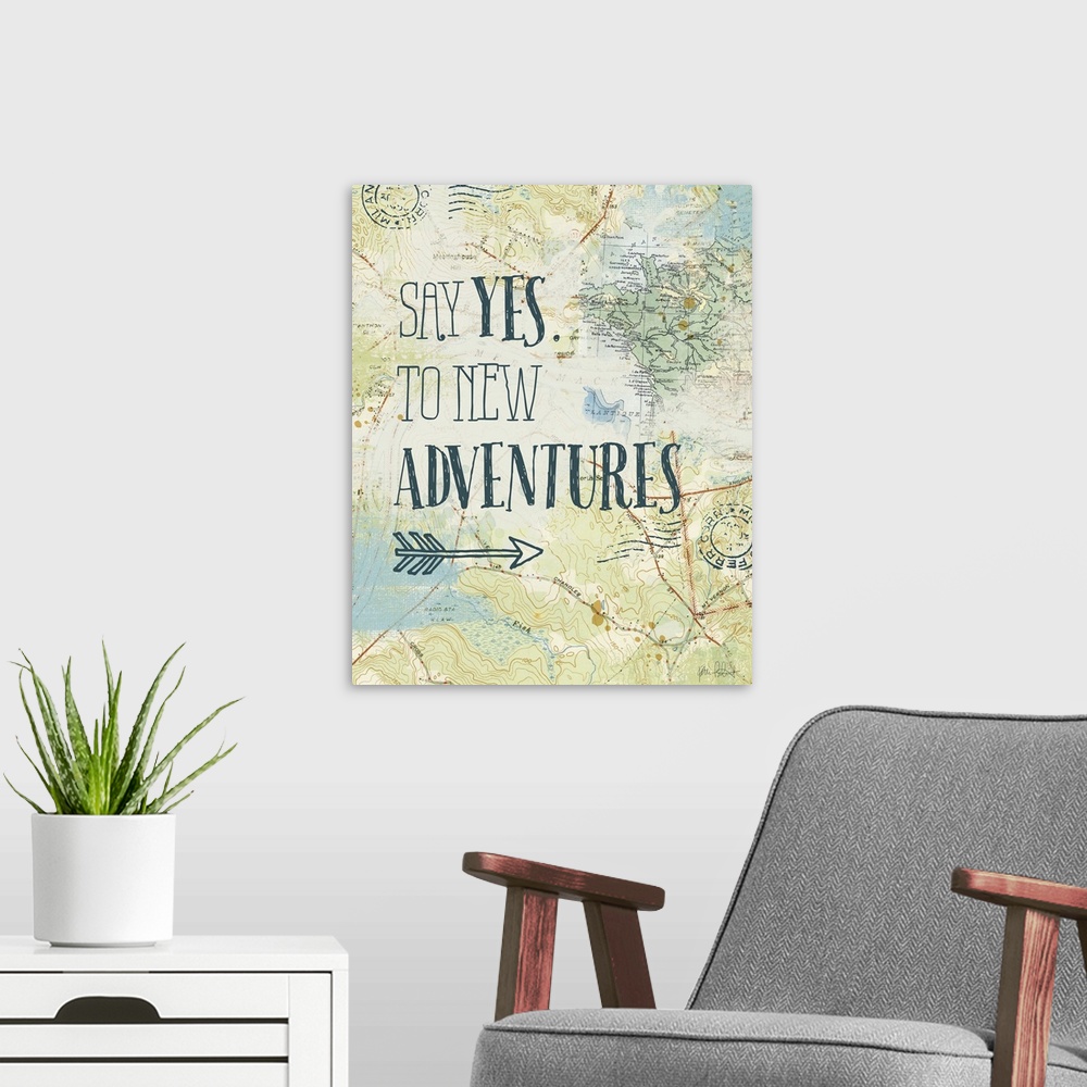 A modern room featuring "Say Yes. To New Adventures" written on top of a map and postage stamp collage.