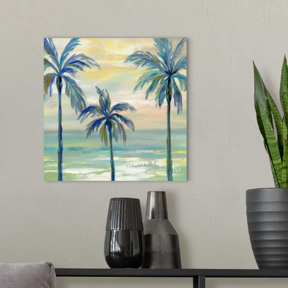 A modern room featuring Contemporary painting of three palm trees in cool tones with the ocean in the background and a su...