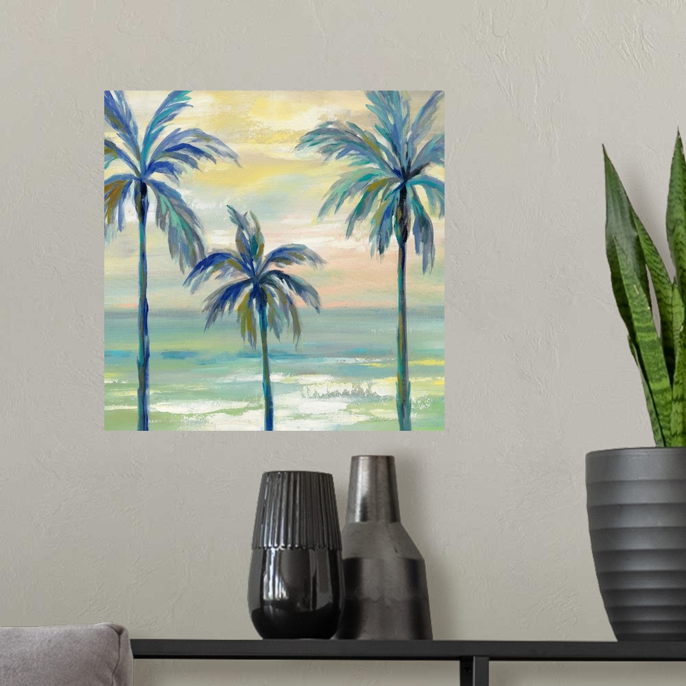 A modern room featuring Contemporary painting of three palm trees in cool tones with the ocean in the background and a su...