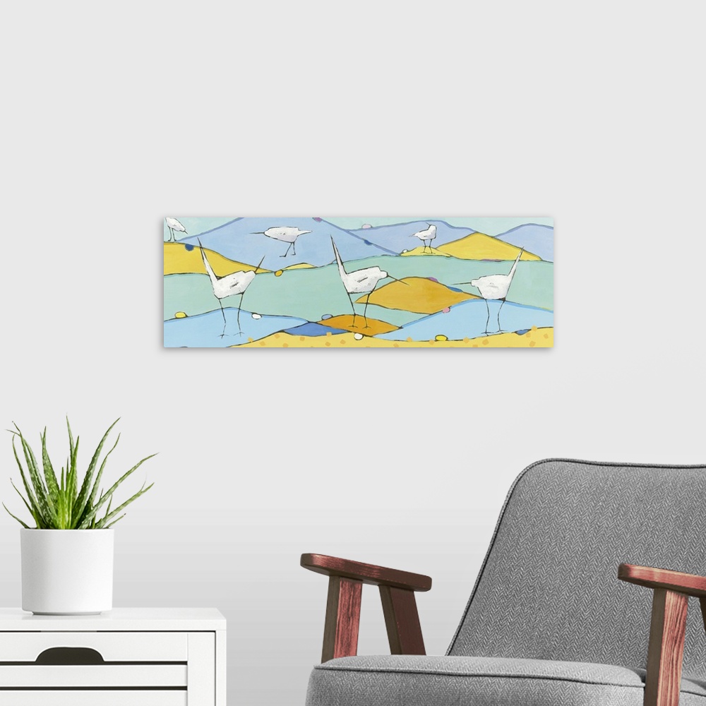 A modern room featuring Long, horizontal abstract painting of six white egrets in a pastel colored marsh.