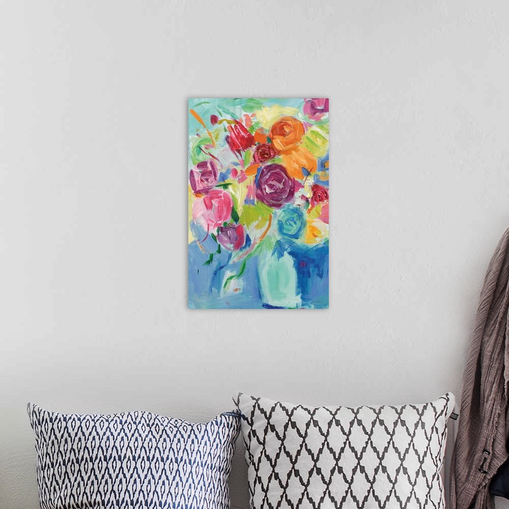 A bohemian room featuring Impressionist painting of pastel colored florals in an aqua vase.