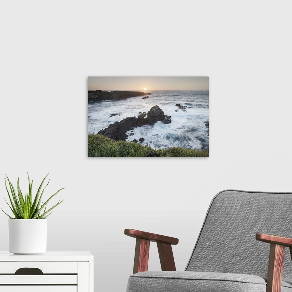 A modern room featuring Photograph of the sunset over Mendocino Headlands, California