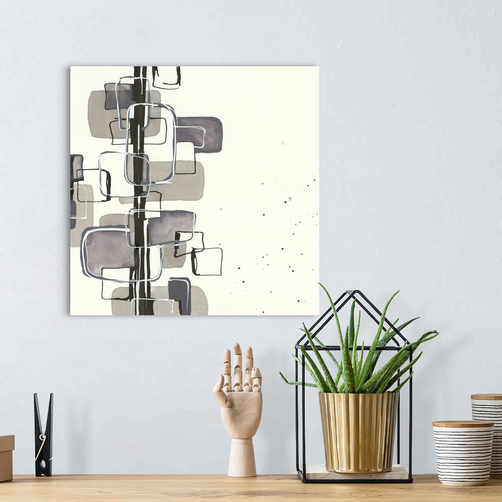 A bohemian room featuring An asymmetrical abstract painting of various square sizes overlapping a black vertical line.