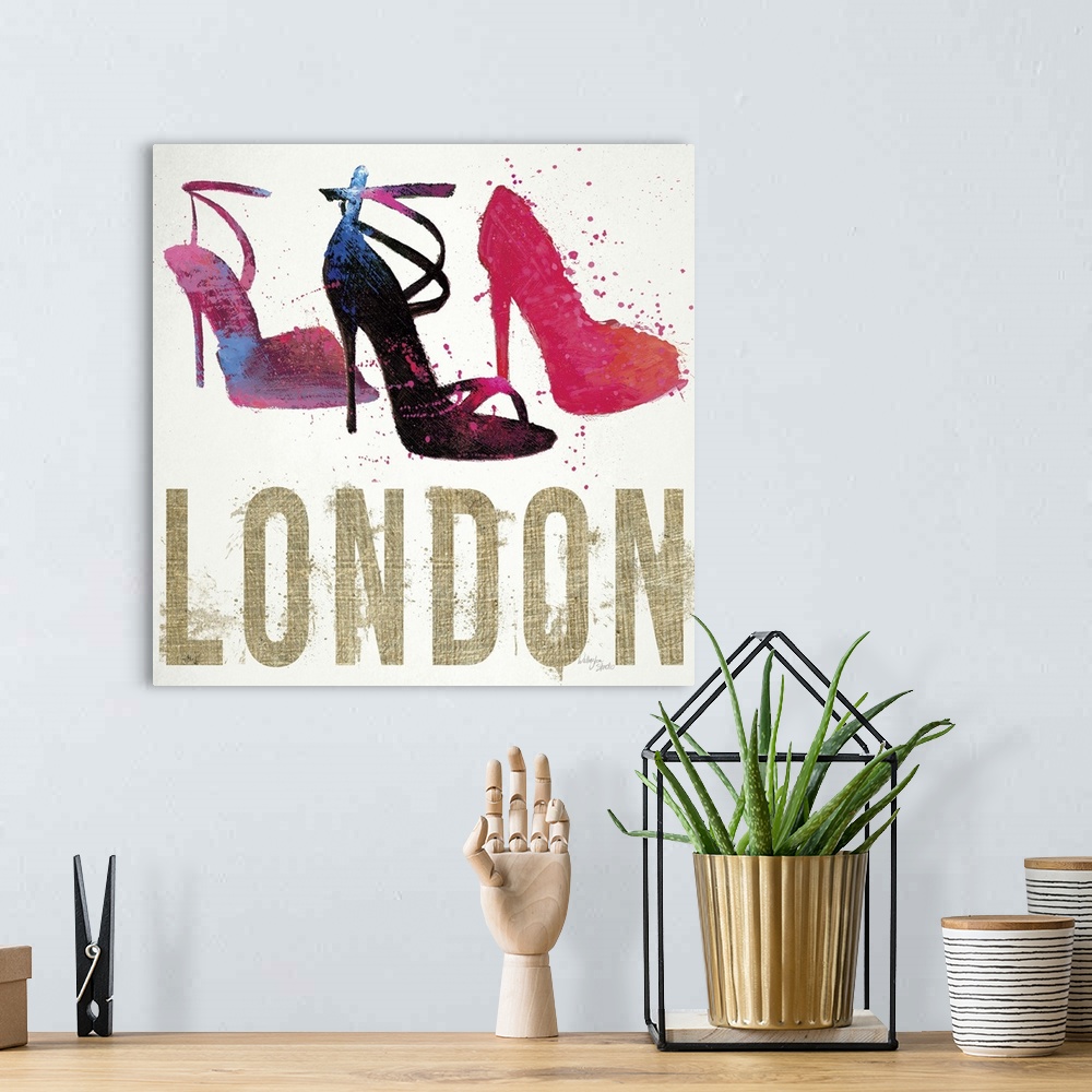 A bohemian room featuring Design featuring three high-heeled shoes and the word "London," done in a messy, spray-painted st...