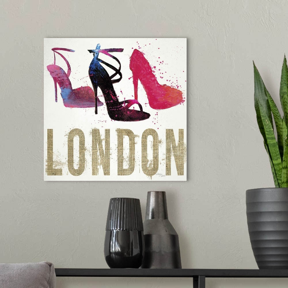 A modern room featuring Design featuring three high-heeled shoes and the word "London," done in a messy, spray-painted st...