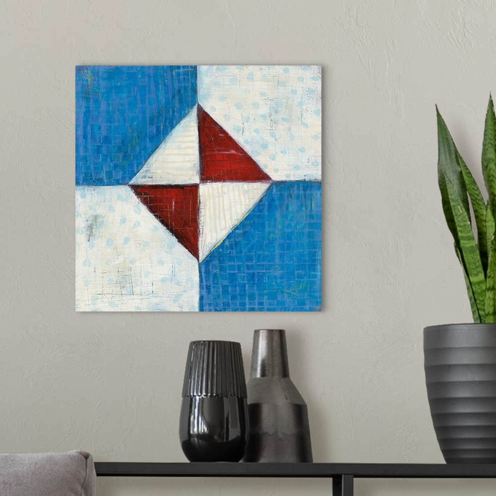 A modern room featuring Contemporary folk art style painting of a geometric quilt pattern in red white and blue.