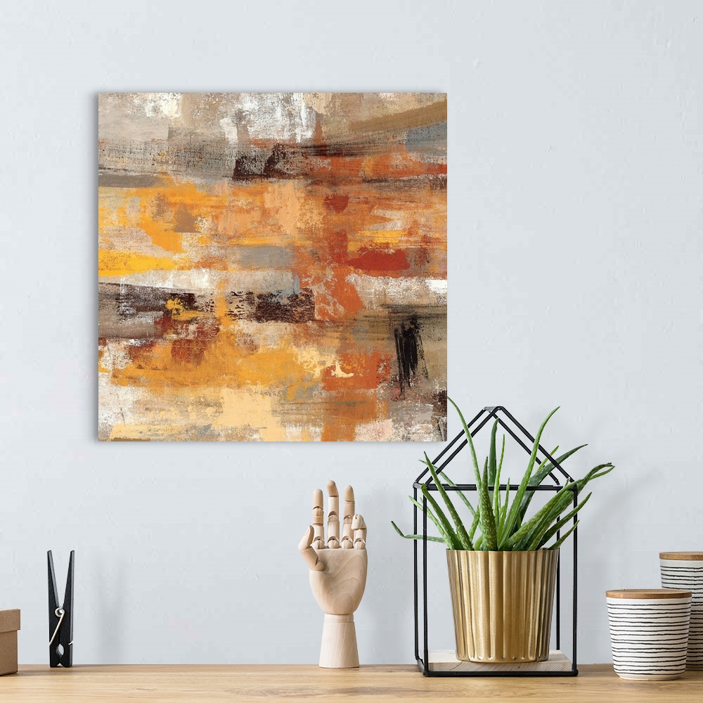 A bohemian room featuring An abstract piece of art with different earth toned brush strokes.