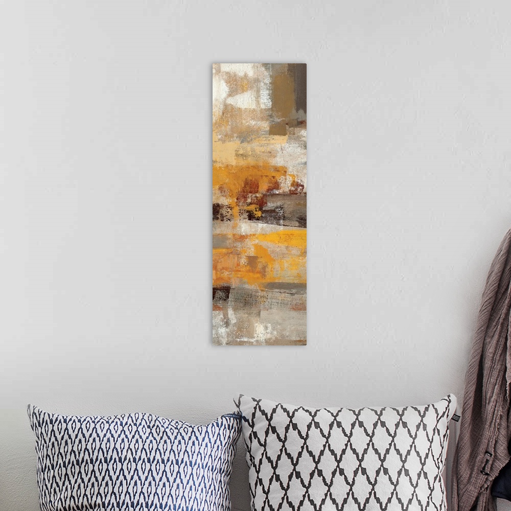 A bohemian room featuring An abstract piece of art with brush strokes of earthy tones giving the painting depth.