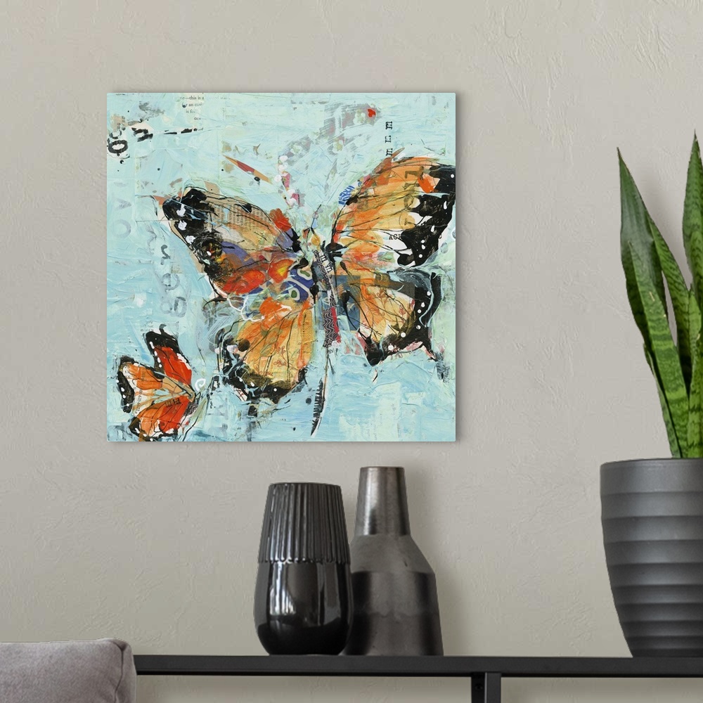 A modern room featuring Two orange butterflies on a sky blue background made with mixed media.