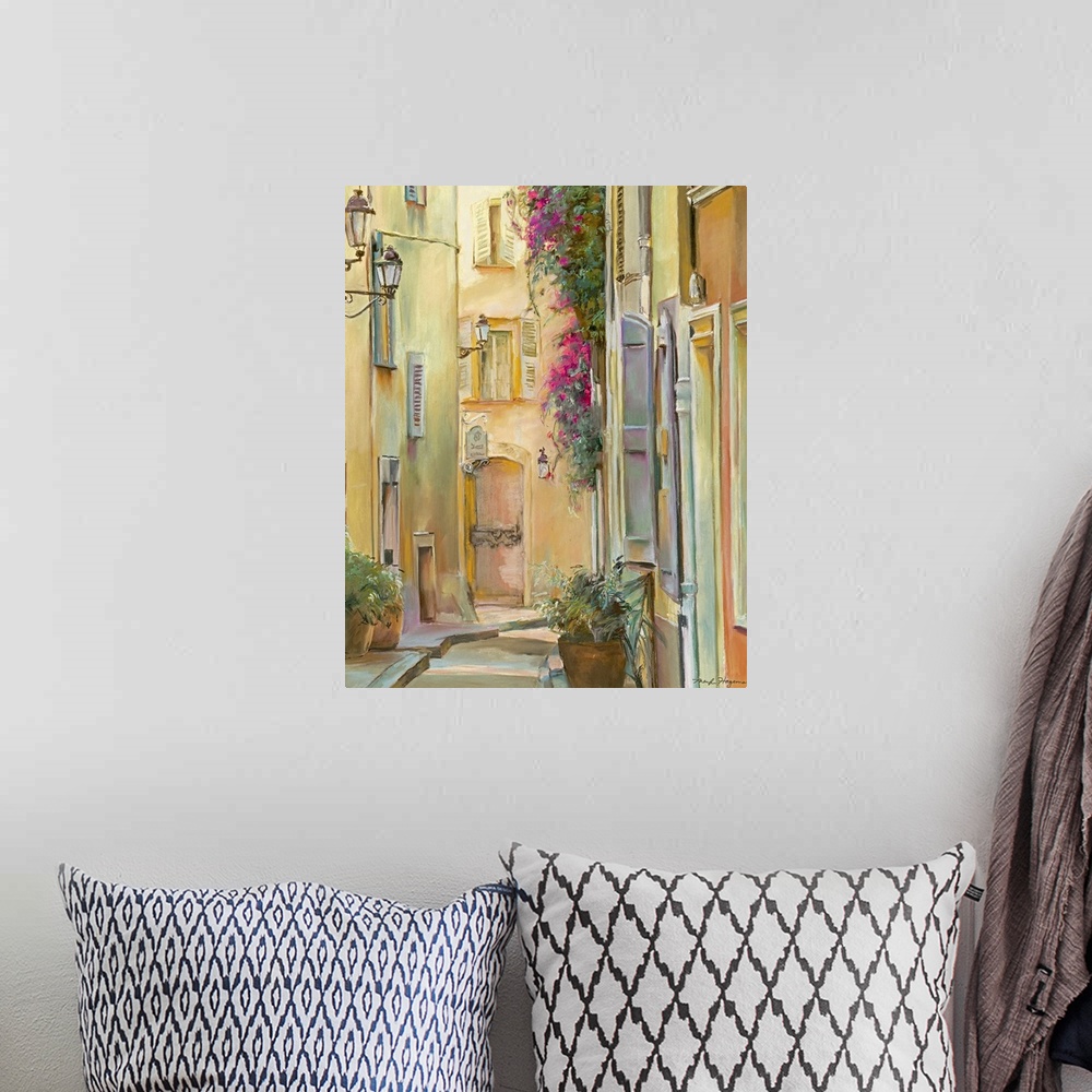 A bohemian room featuring Painting of village alleyway lined with buildings full of windows and flower pots.