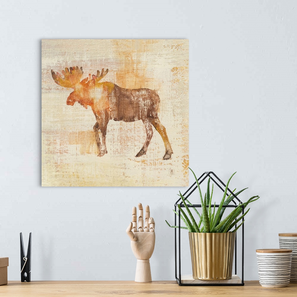 A bohemian room featuring Large square painting of a moose in textured brush strokes in orange, brown and gold.