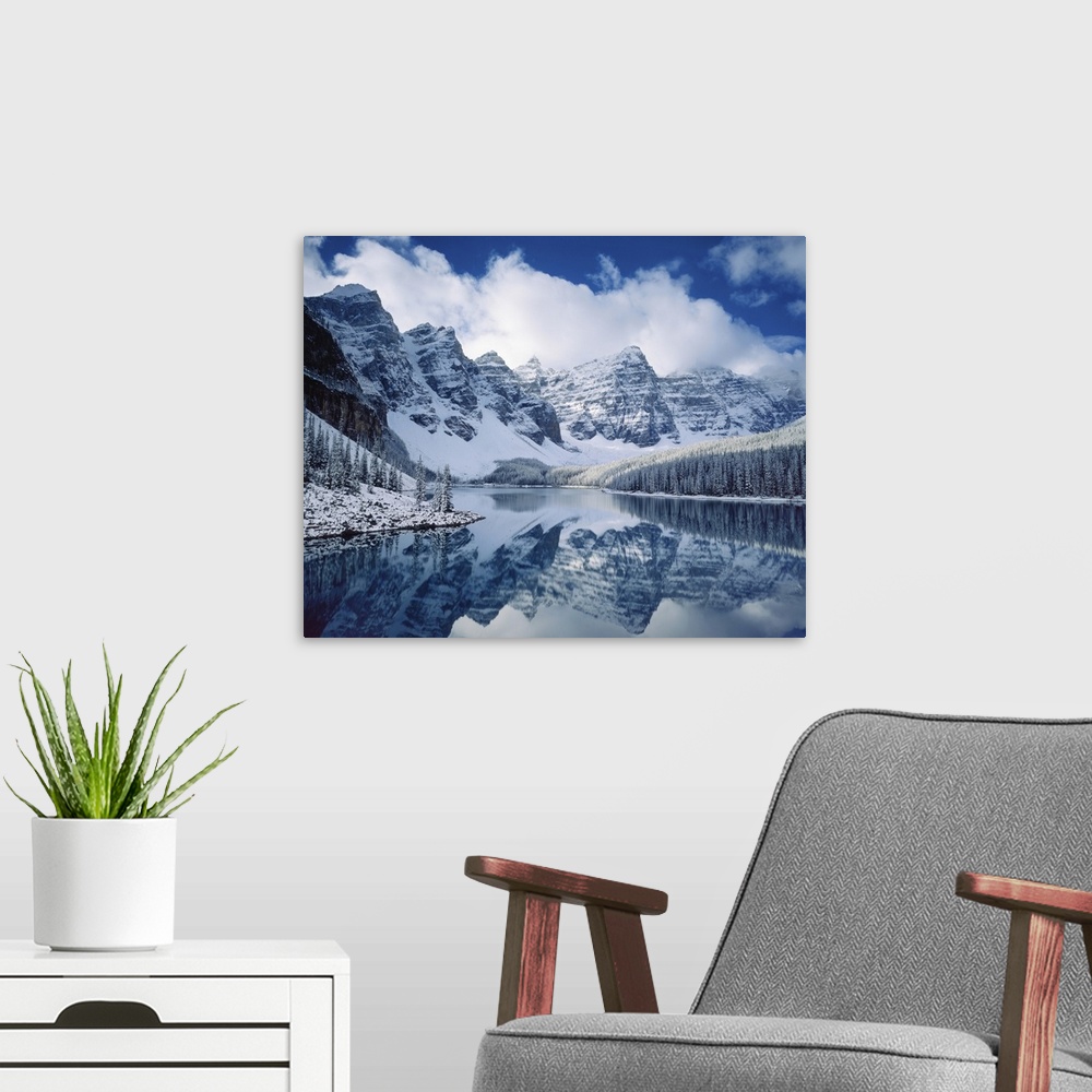 A modern room featuring Photograph of an Autumn snowfall on Moraine Lake, Banff National Park Alberta Canada
