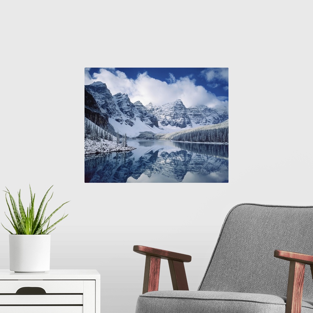 A modern room featuring Photograph of an Autumn snowfall on Moraine Lake, Banff National Park Alberta Canada