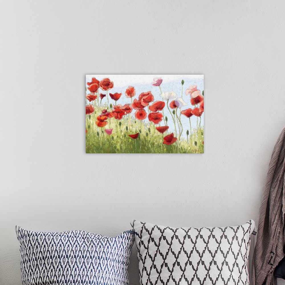 A bohemian room featuring A horizontal impressionistic painting of a field of poppies.