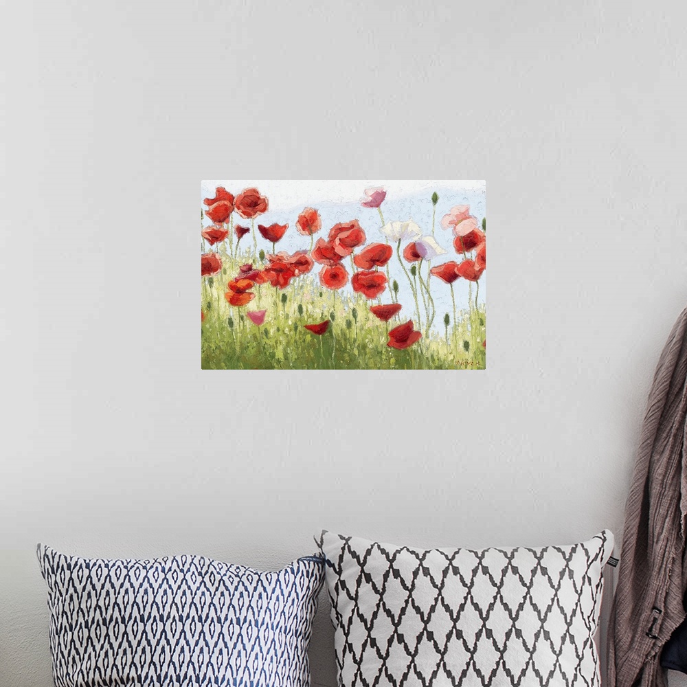 A bohemian room featuring A horizontal impressionistic painting of a field of poppies.