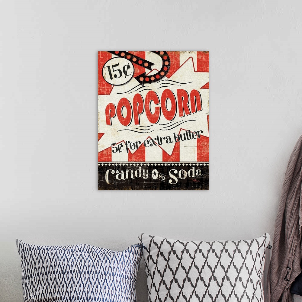 A bohemian room featuring Canvas print of a vintage advertisement for popcorn and candy.