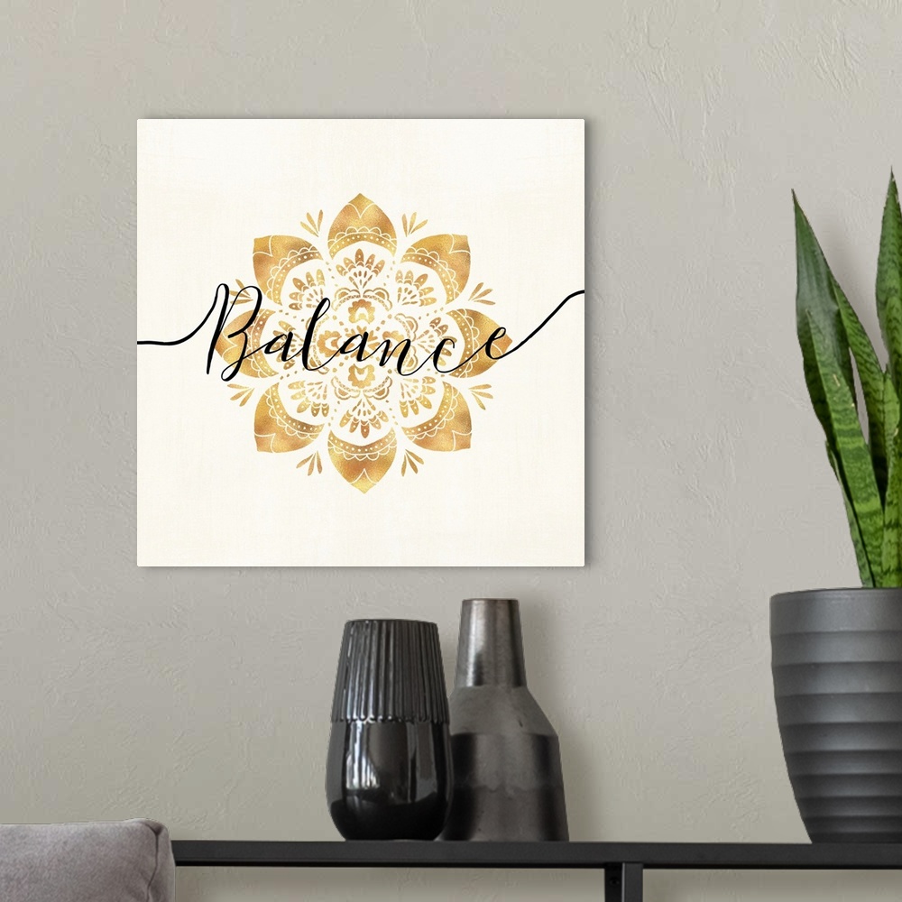 A modern room featuring Shiny gold mandala on a neutral background with the word "Balance" written through the center.
