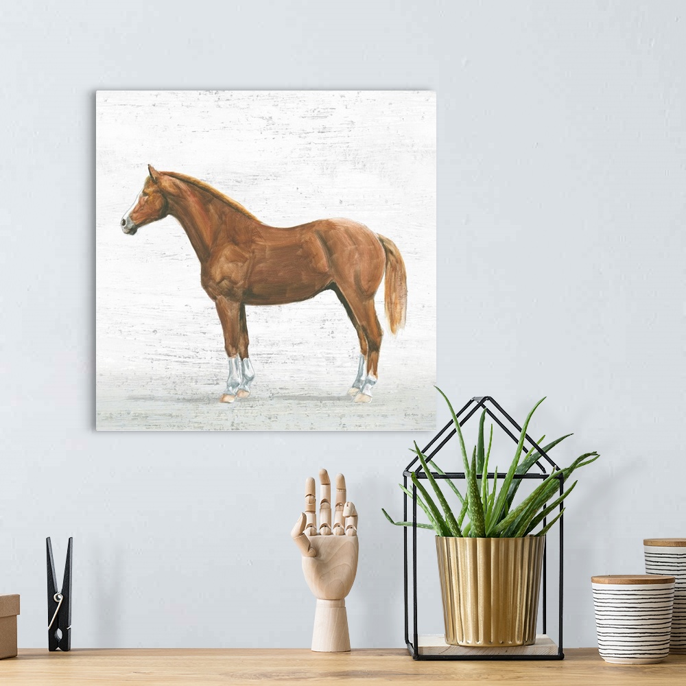 A bohemian room featuring Square painting of a light brown horse on a textured white and gray background.