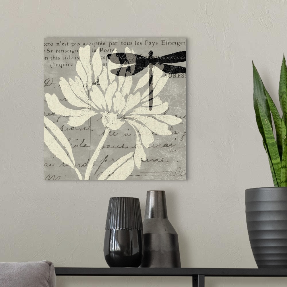 A modern room featuring Giant, square home art docor of a large, solid color flower, and a dark, semi-transparent dragonf...