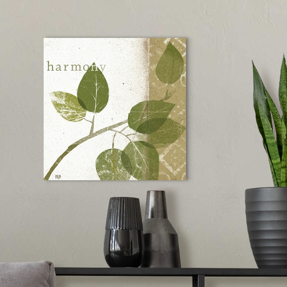 A modern room featuring Contemporary artwork with eroded branch and leaf silhouettes with the text "harmony" overlain.