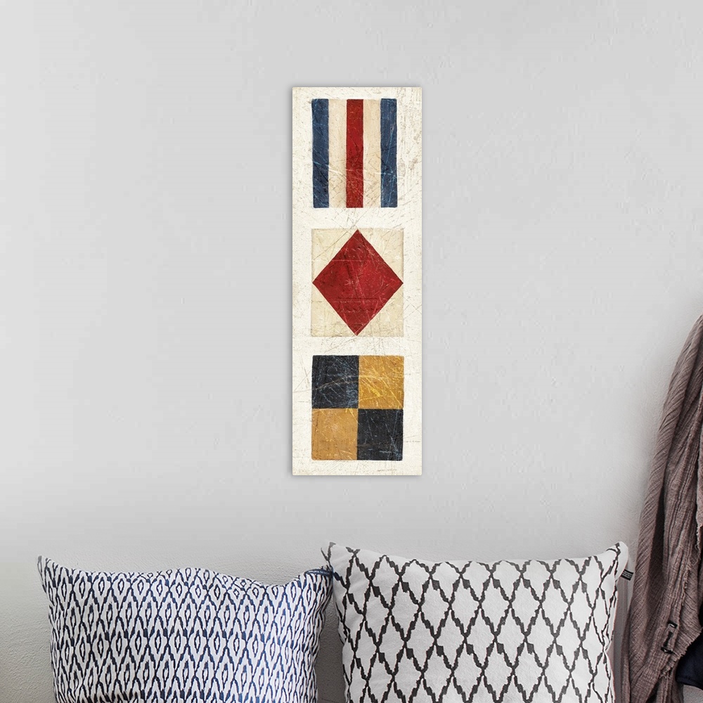A bohemian room featuring Vertical painting of three nautical flags.