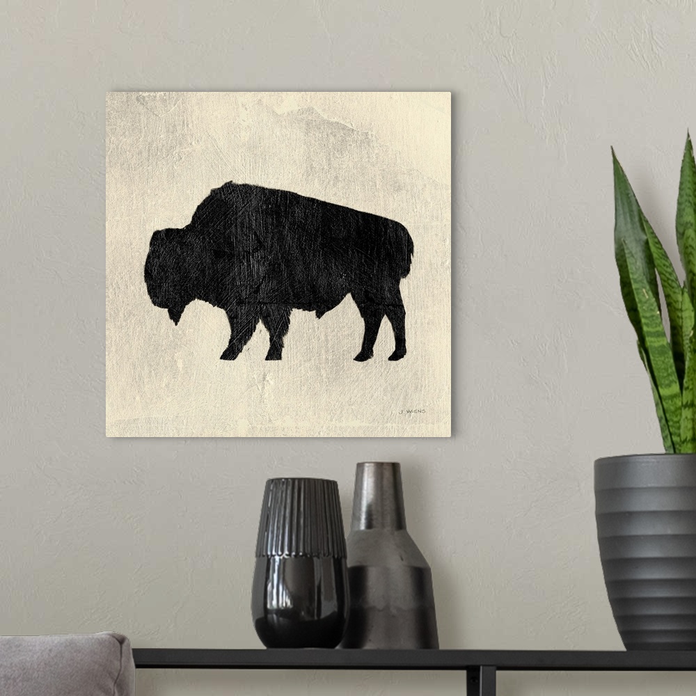 A modern room featuring Decorative artwork of a bison silhouette over cream colored background with paint brush textures ...