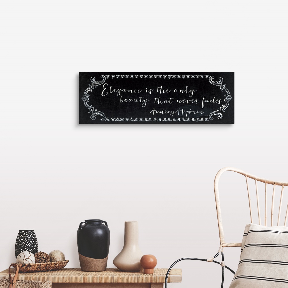 A farmhouse room featuring Horizontal, large wall hanging of white script text that reads "Elegance is the only beauty that ...