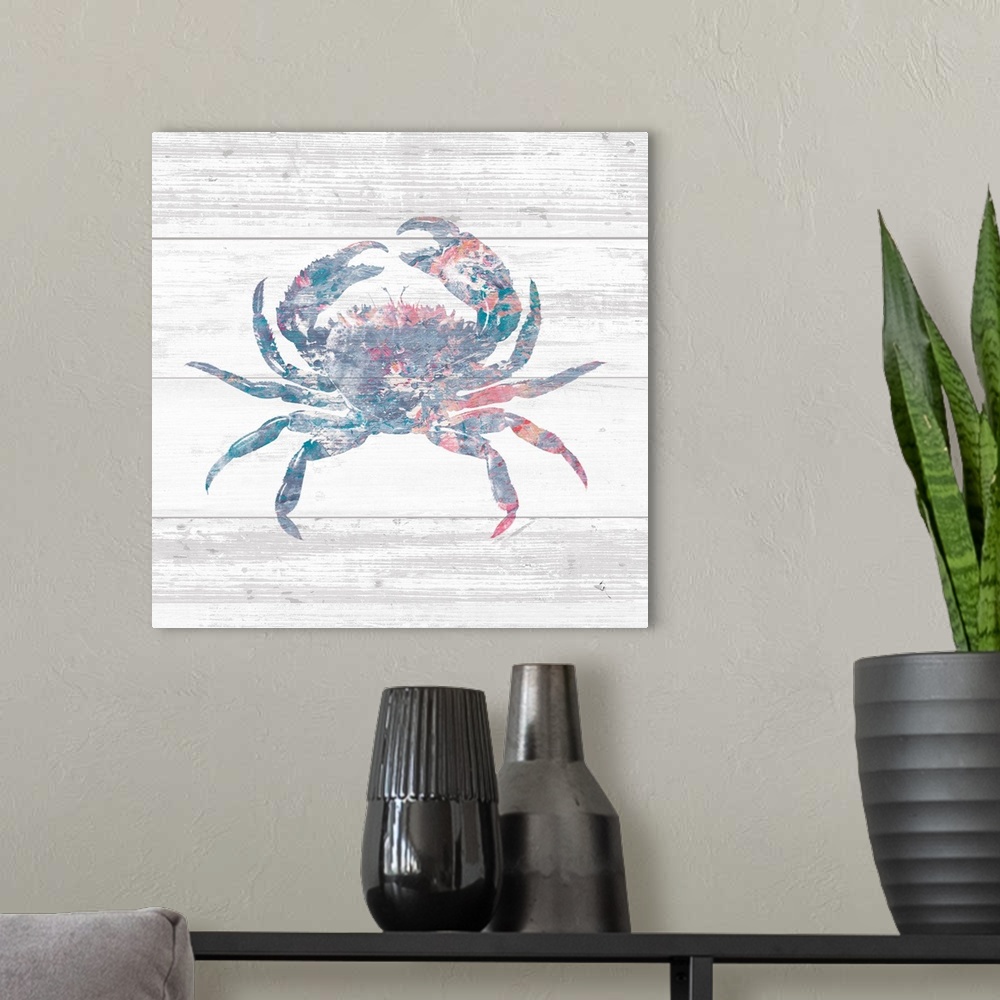 A modern room featuring Square beach decor with a silhouette of a blue, pink, red, and white crab on a rustic, white, woo...