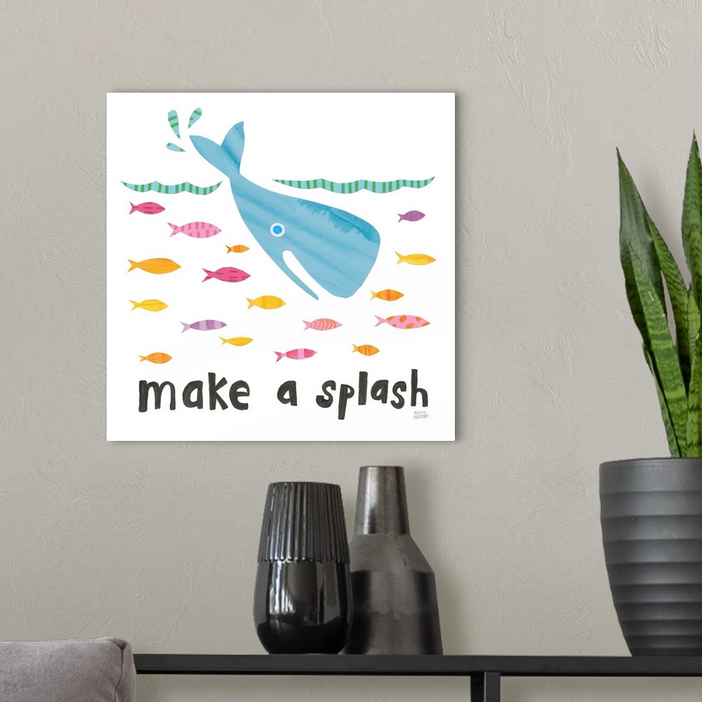 A modern room featuring "Make a Splash" written in black underneath a whale and fish in the ocean, made from individual c...