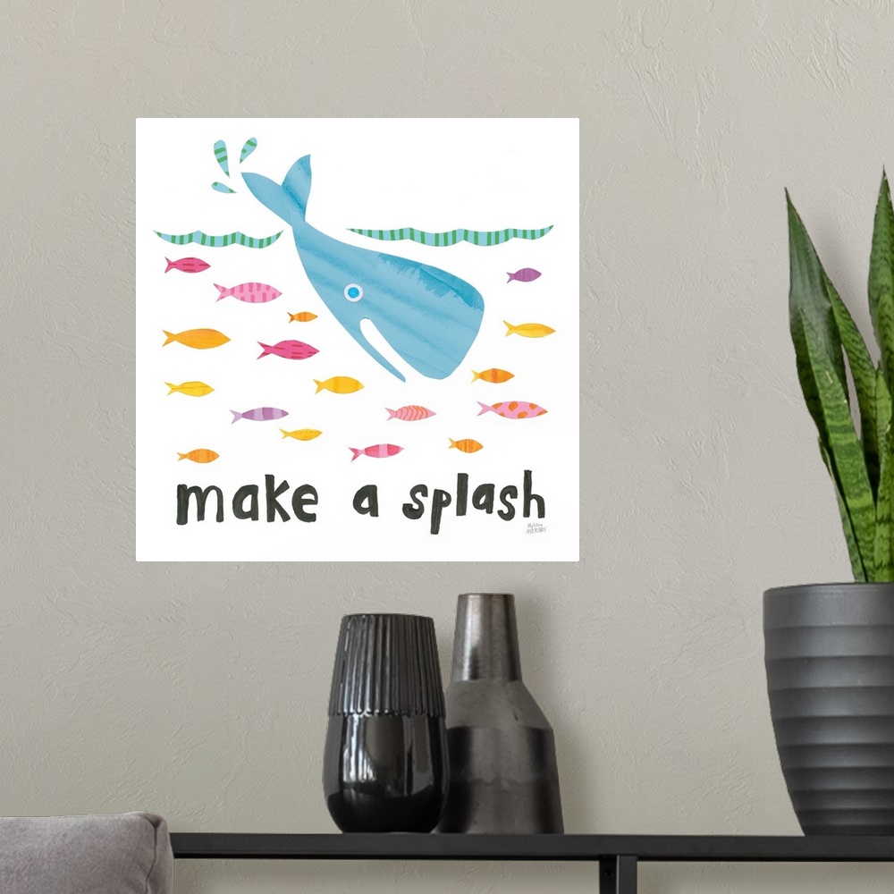 A modern room featuring "Make a Splash" written in black underneath a whale and fish in the ocean, made from individual c...