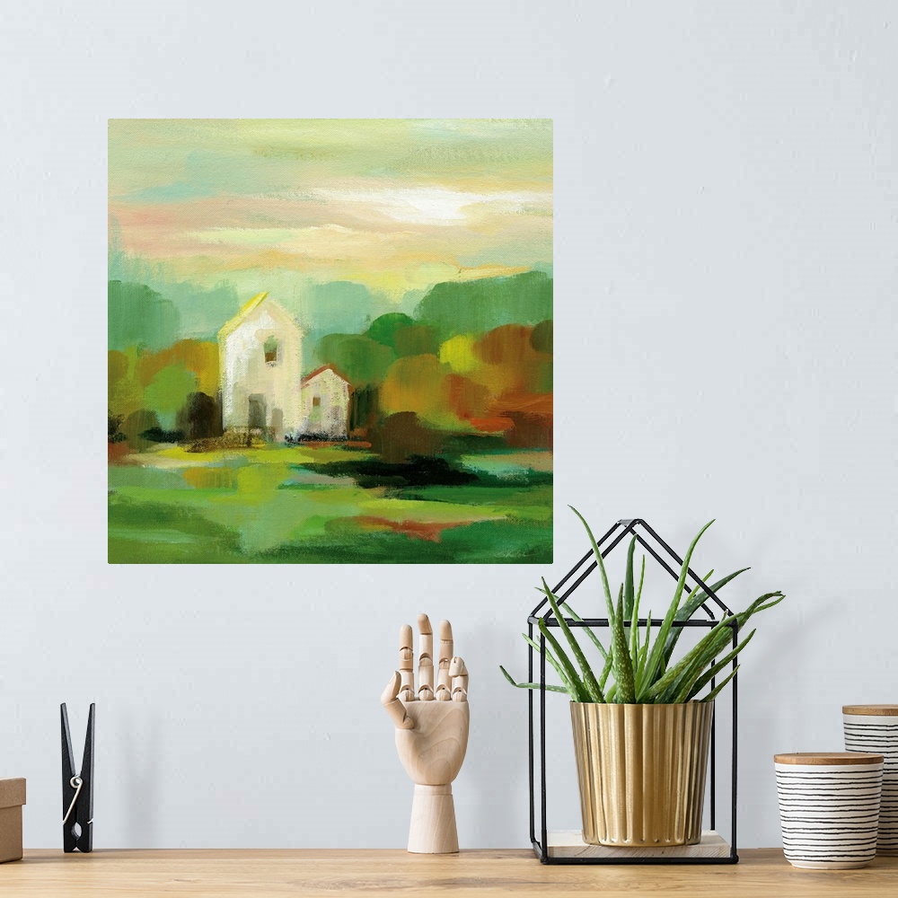 A bohemian room featuring Contemporary landscape painting with a white barn house and Autumn colored trees.