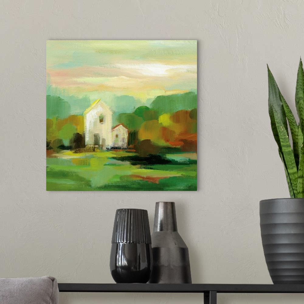 A modern room featuring Contemporary landscape painting with a white barn house and Autumn colored trees.