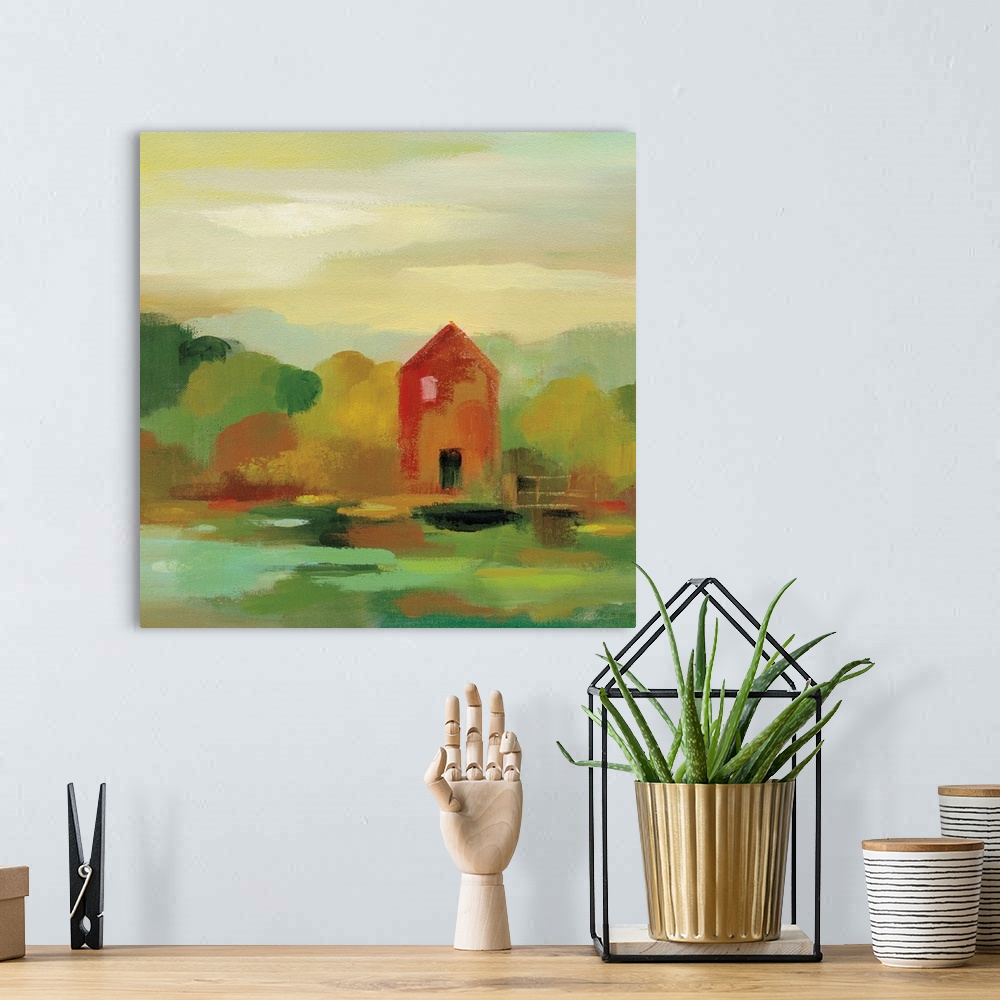 A bohemian room featuring Contemporary landscape painting with a red barn house and Autumn colored trees.