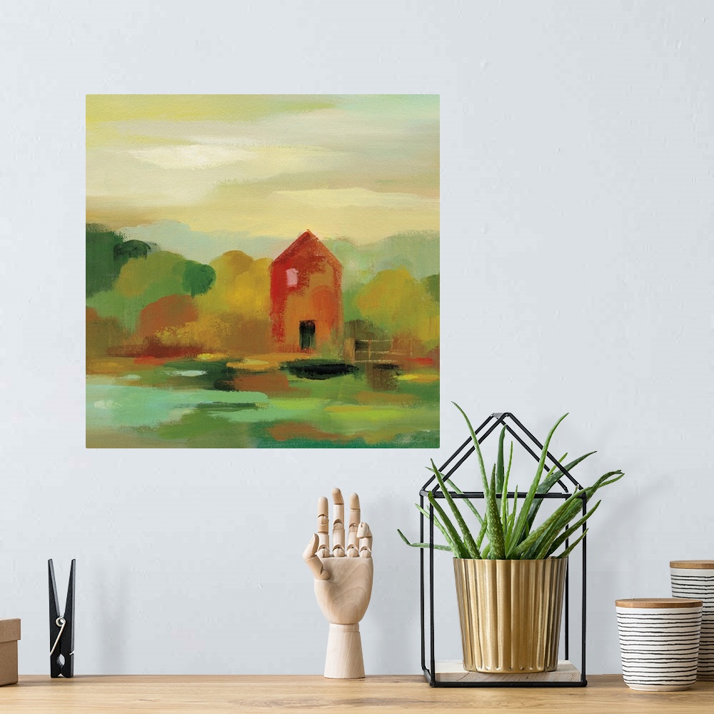 A bohemian room featuring Contemporary landscape painting with a red barn house and Autumn colored trees.