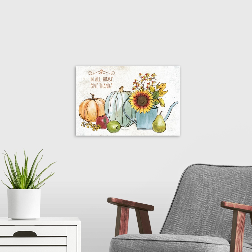 A modern room featuring Decorative artwork of autumn themed items with the words, 'In all things, give thanks'.