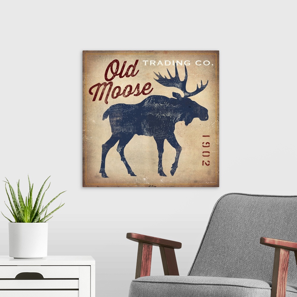 A modern room featuring Retro style sign for Old Moose Trading Company, with a blue moose silhouette.