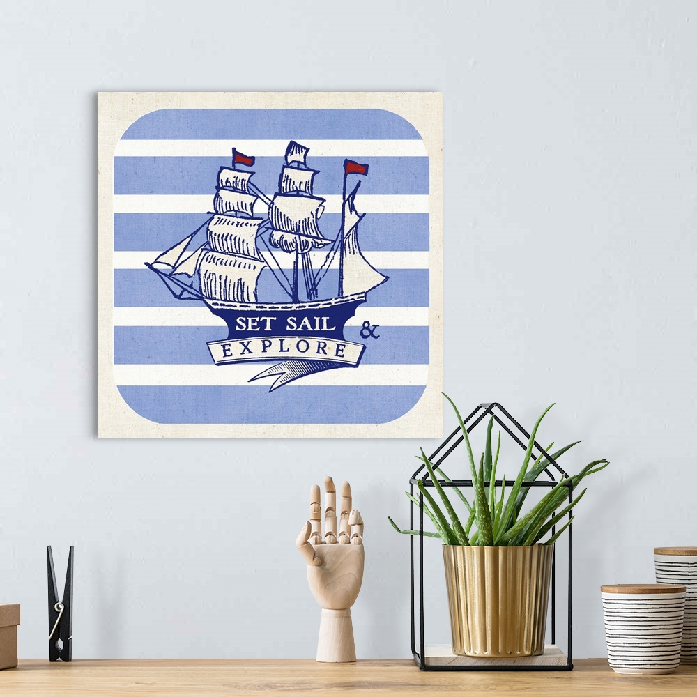 A bohemian room featuring Contemporary nautical themed sentiment art with a ship against a blue and white striped background.