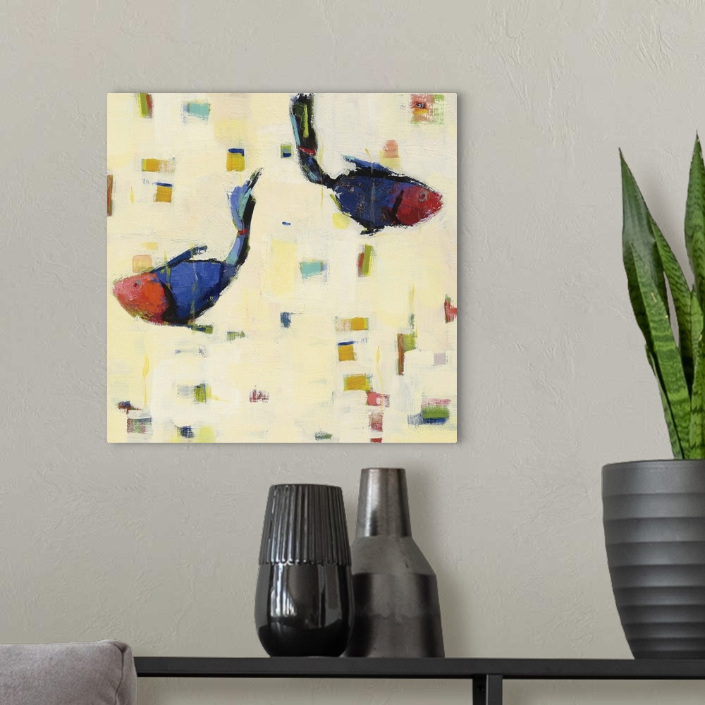 A modern room featuring Contemporary abstract painting of two blue and red fish swimming opposite ways with colorful squa...