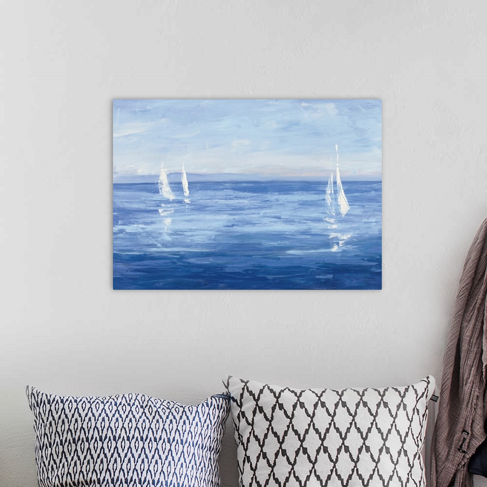 A bohemian room featuring Contemporary painting of white sails from sailboats casting reflections on the calm sea.