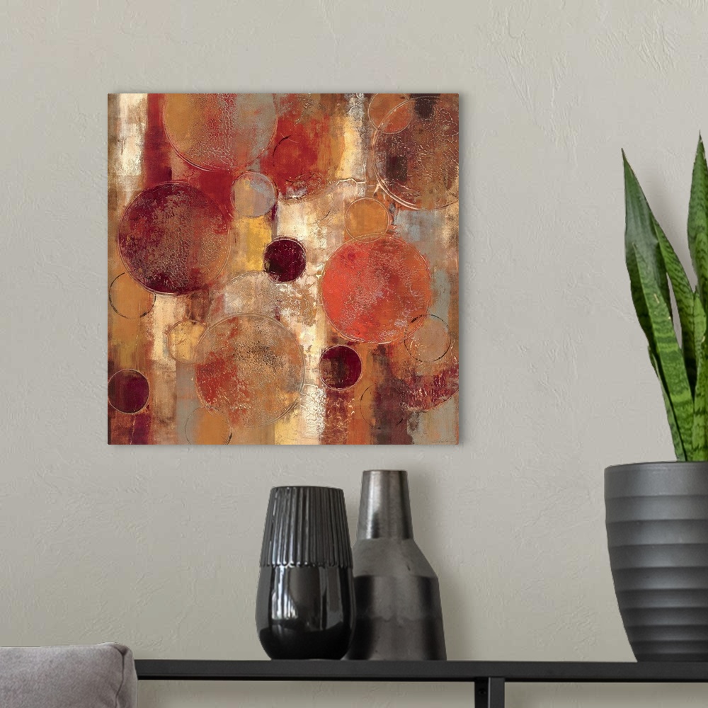 A modern room featuring Muted contemporary abstract painting of overlapping circles varying in size.  The background cons...