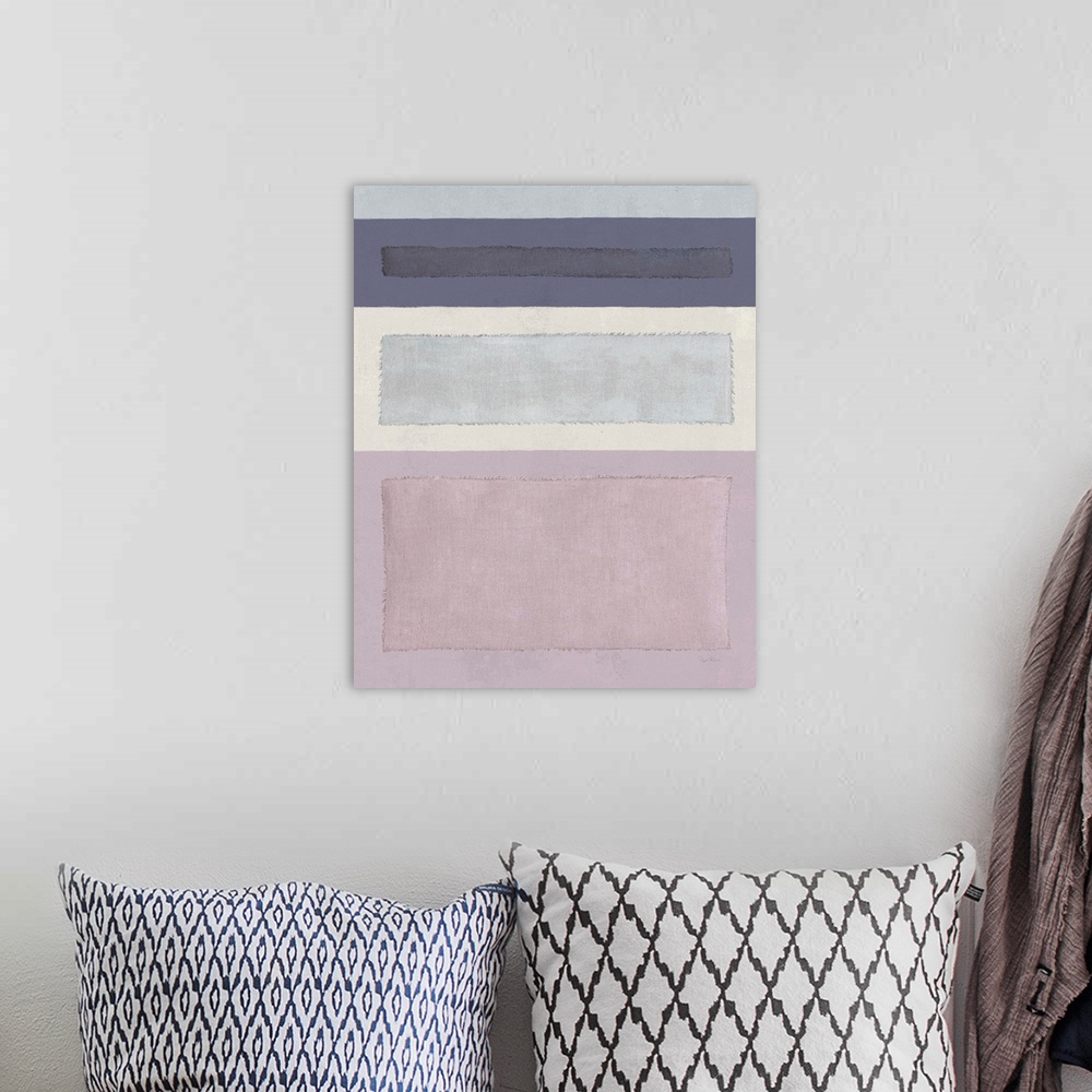 A bohemian room featuring Mixed media art with black, gray, and pink different sized linen rectangles stacked from thinnest...