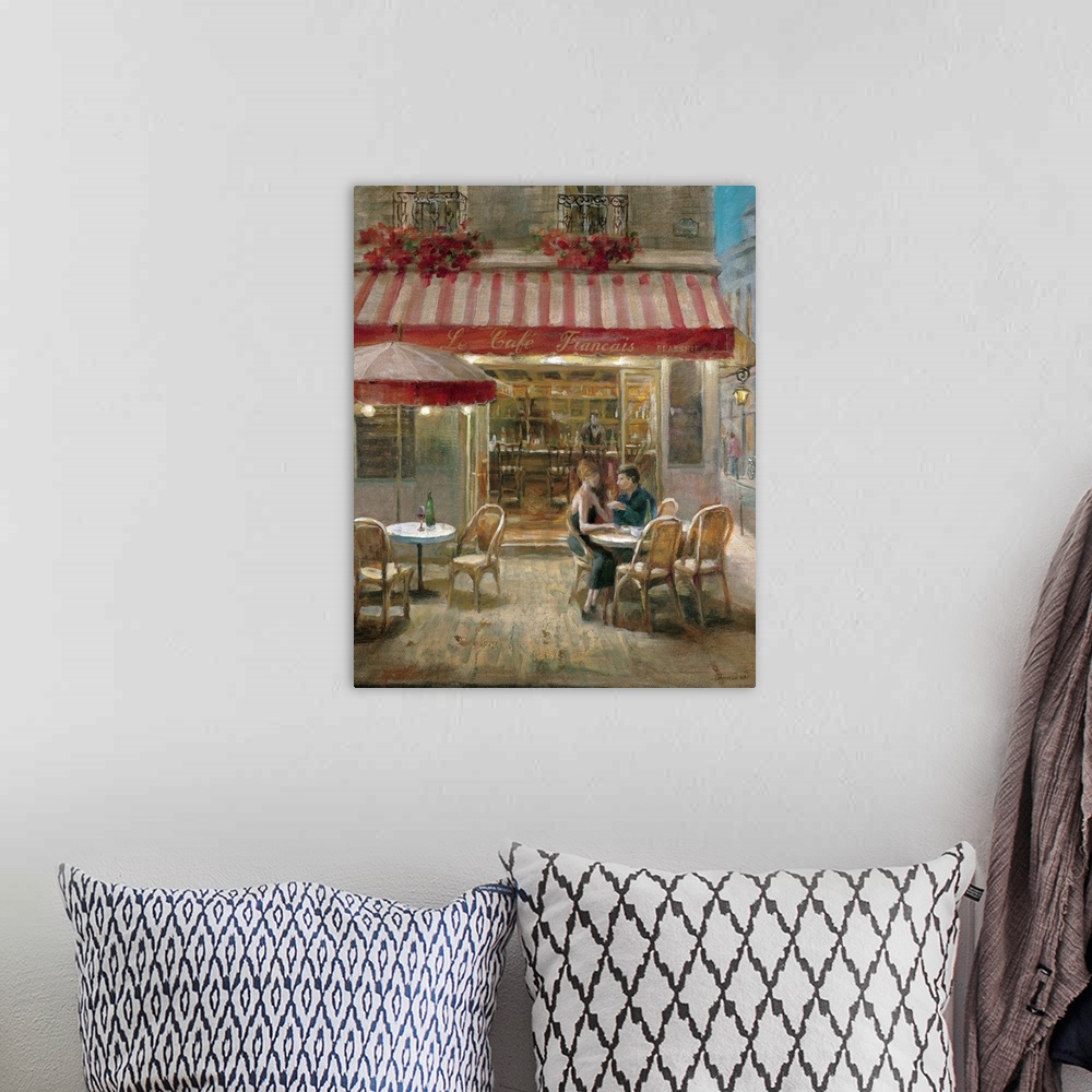 A bohemian room featuring Huge contemporary art depicts a couple sitting alone at a table outside of a small eatery in Fran...