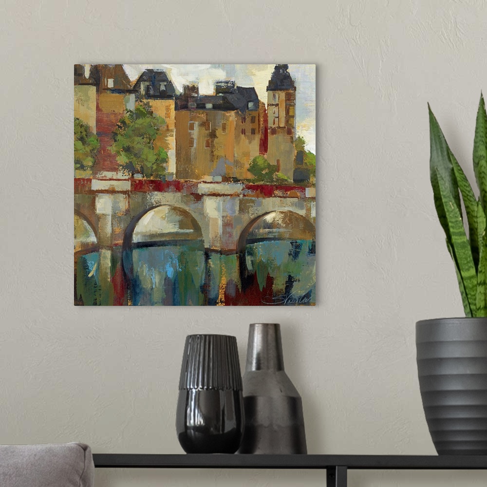 A modern room featuring Abstract painting of a bridge going in front of a town comprised of large brush strokes.