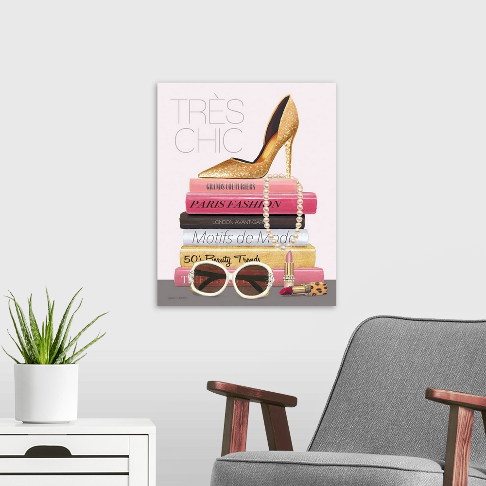 A modern room featuring Decorative chic artwork featuring feminine items stacked with the words, 'Tres Chic' in the top l...