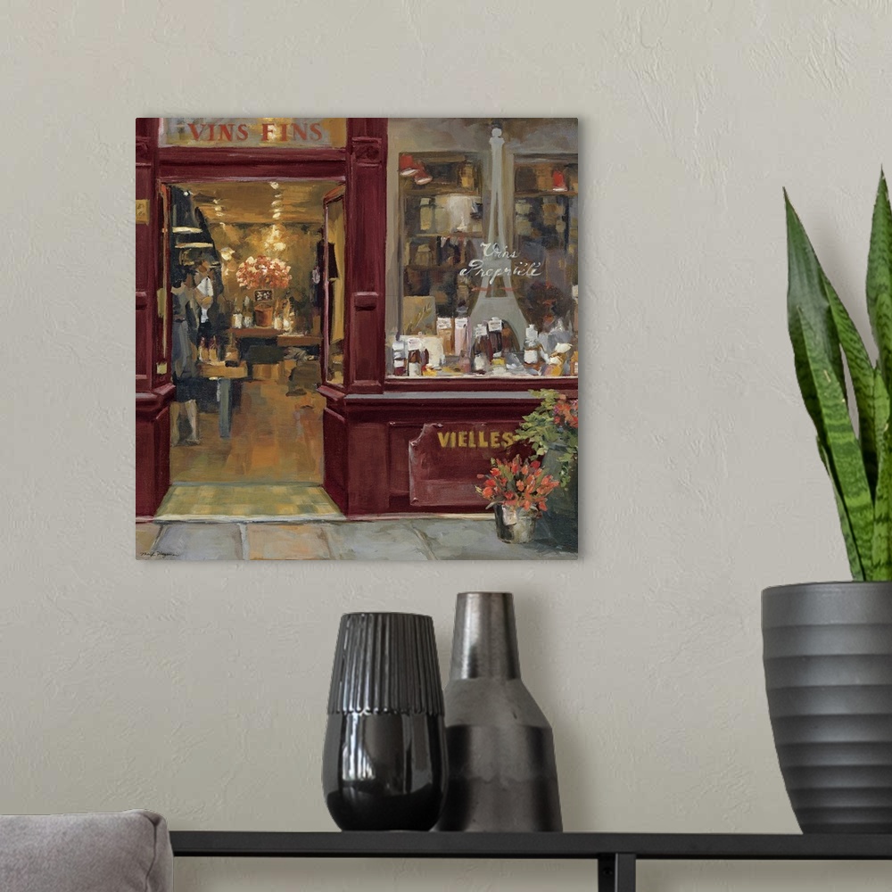 A modern room featuring Square painting on canvas of the outside of a storefront in Paris.