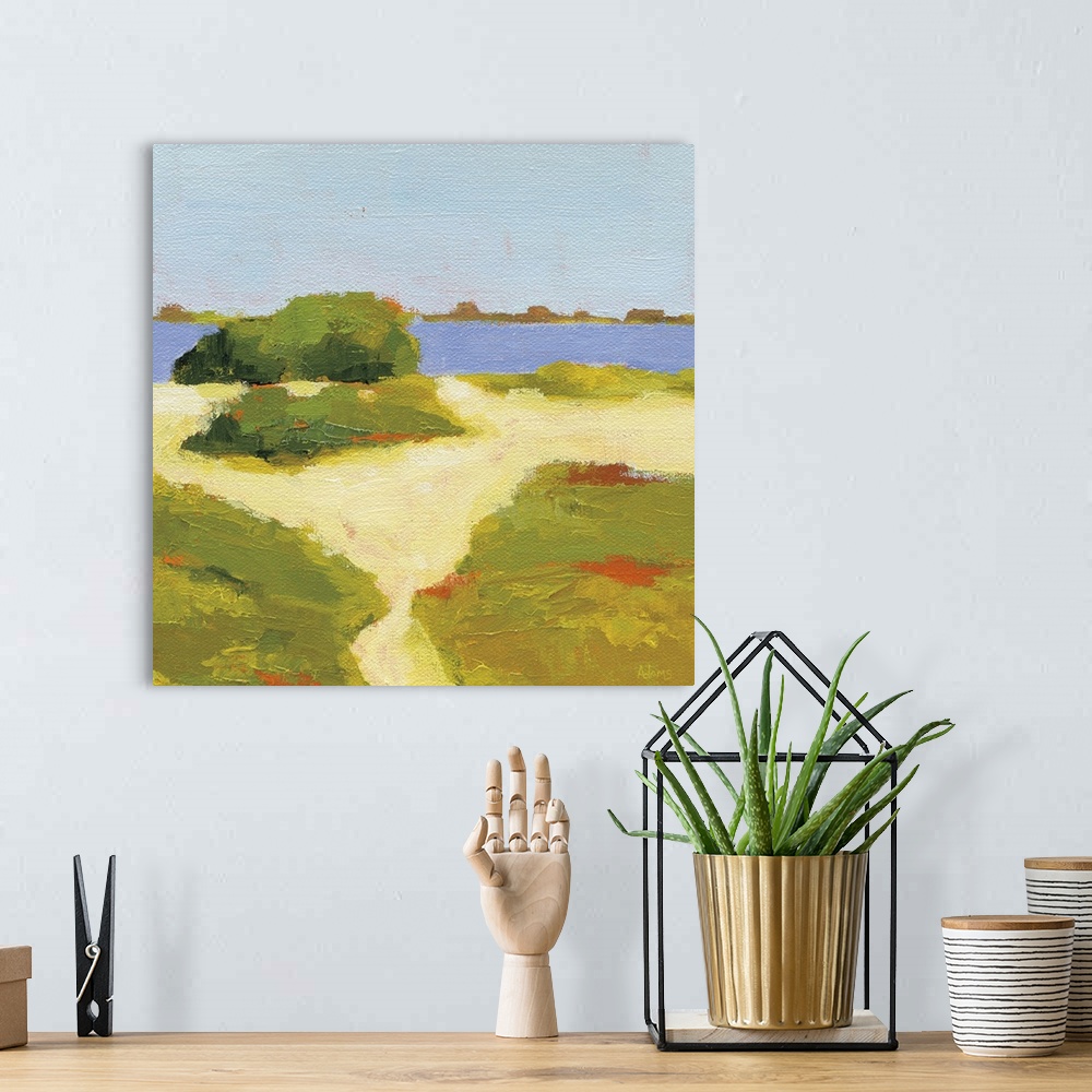 A bohemian room featuring Square abstract painting of a yellow sandy path that leads to the beach.