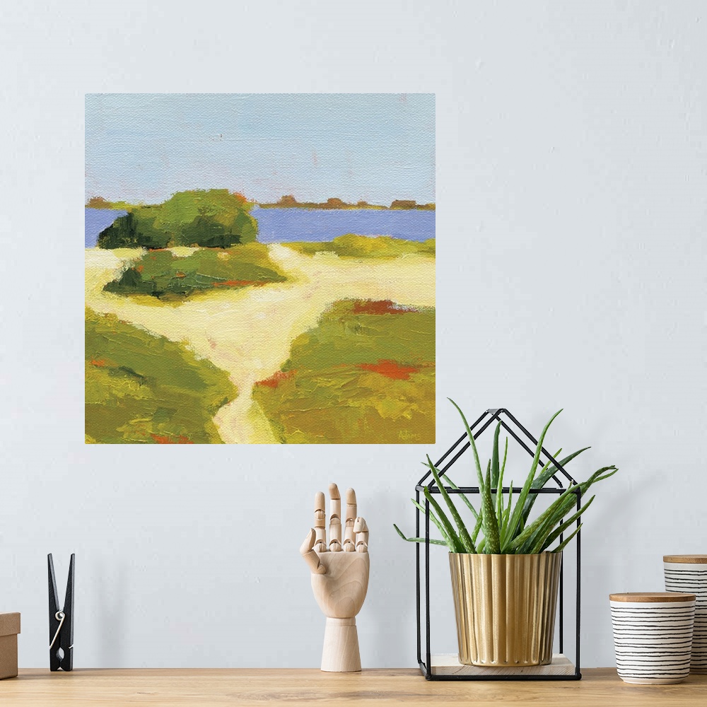 A bohemian room featuring Square abstract painting of a yellow sandy path that leads to the beach.
