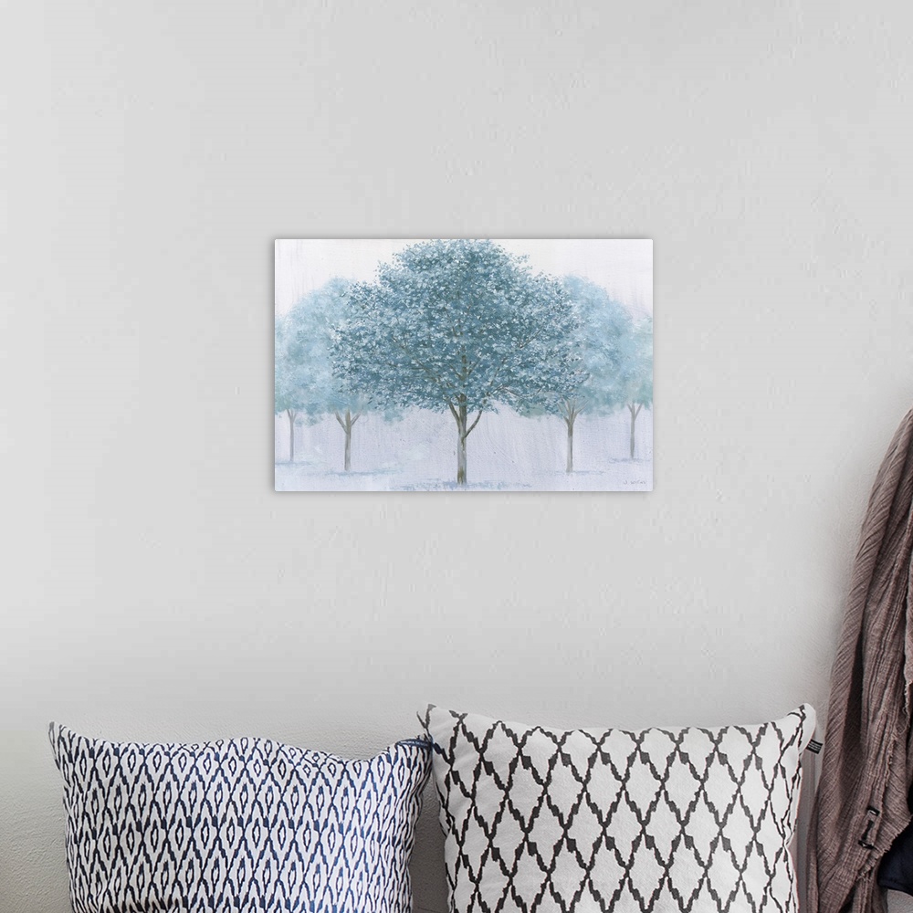 A bohemian room featuring A contemporary painting of a row of trees in blue on a grey backdrop.