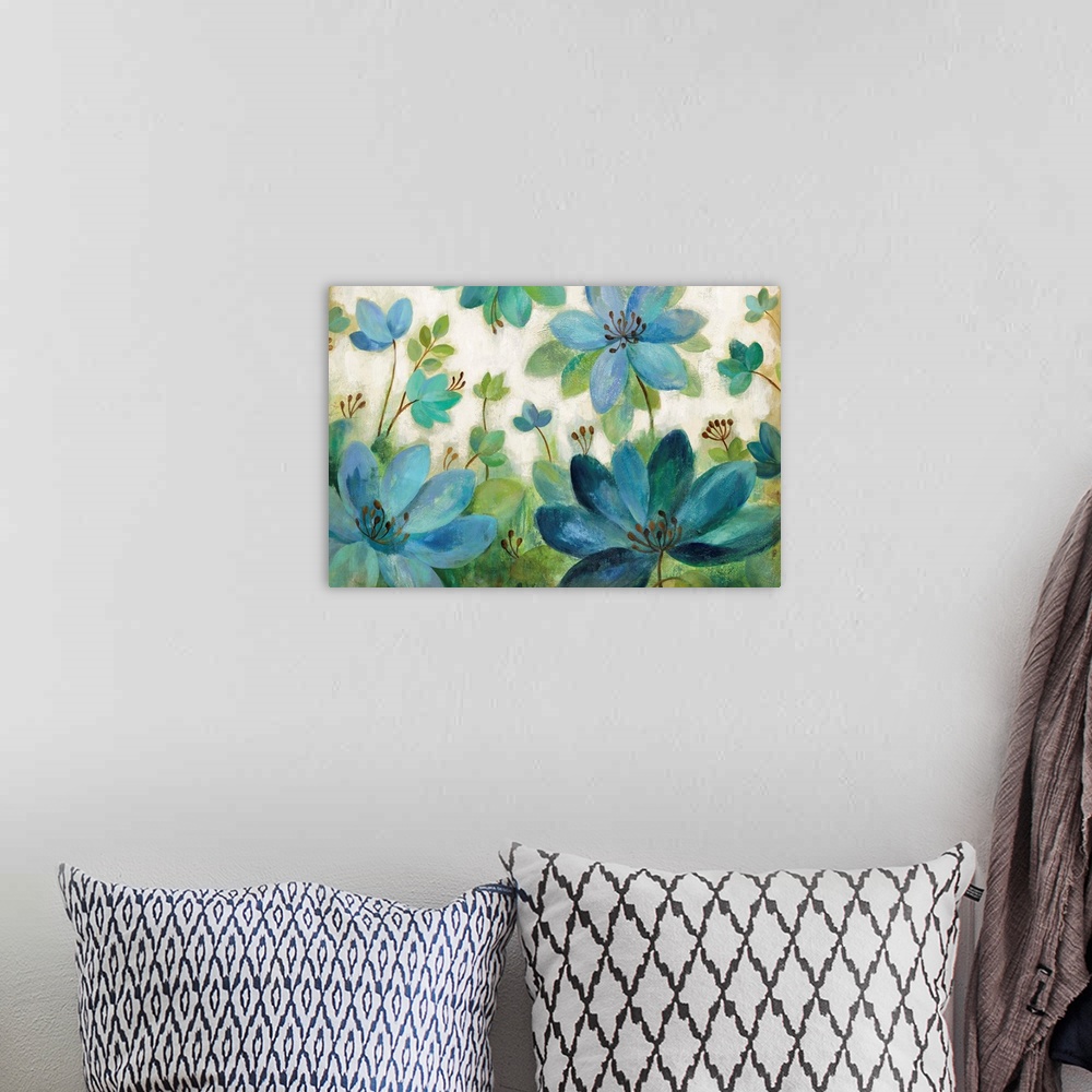 A bohemian room featuring Contemporary painting of blue and green flowers against a cream toned background.